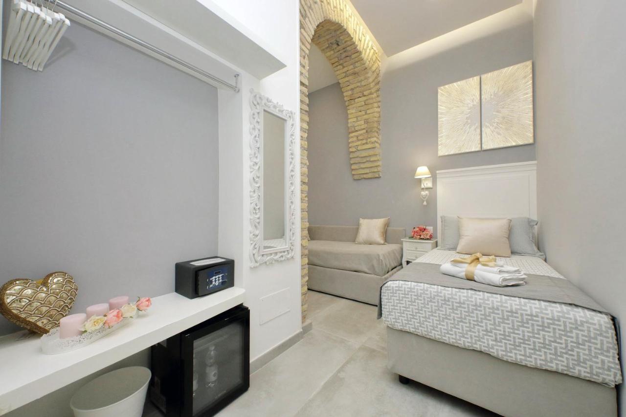 Casa de hóspedes Roman Holiday Suites