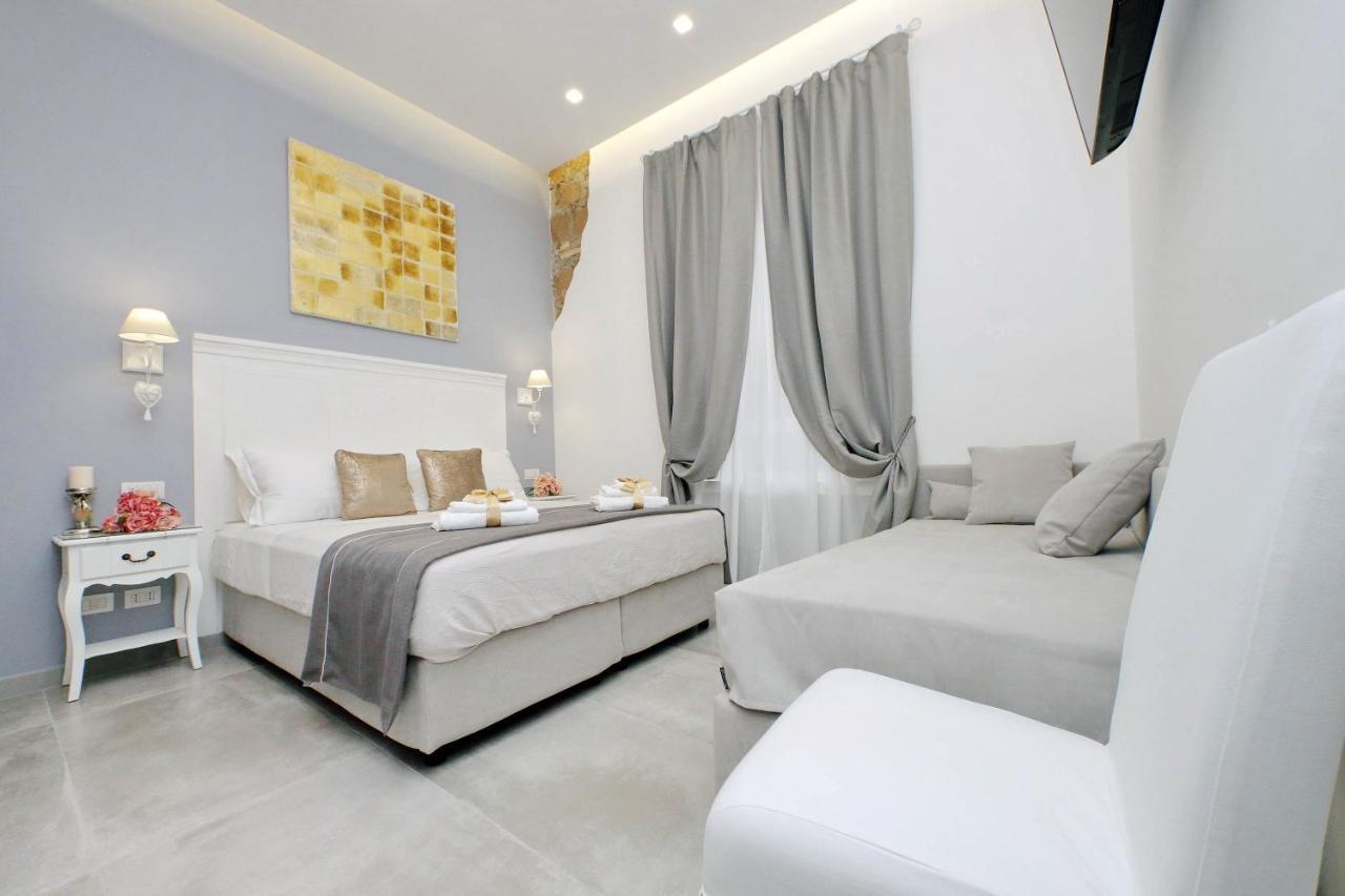 Casa de hóspedes Roman Holiday Suites