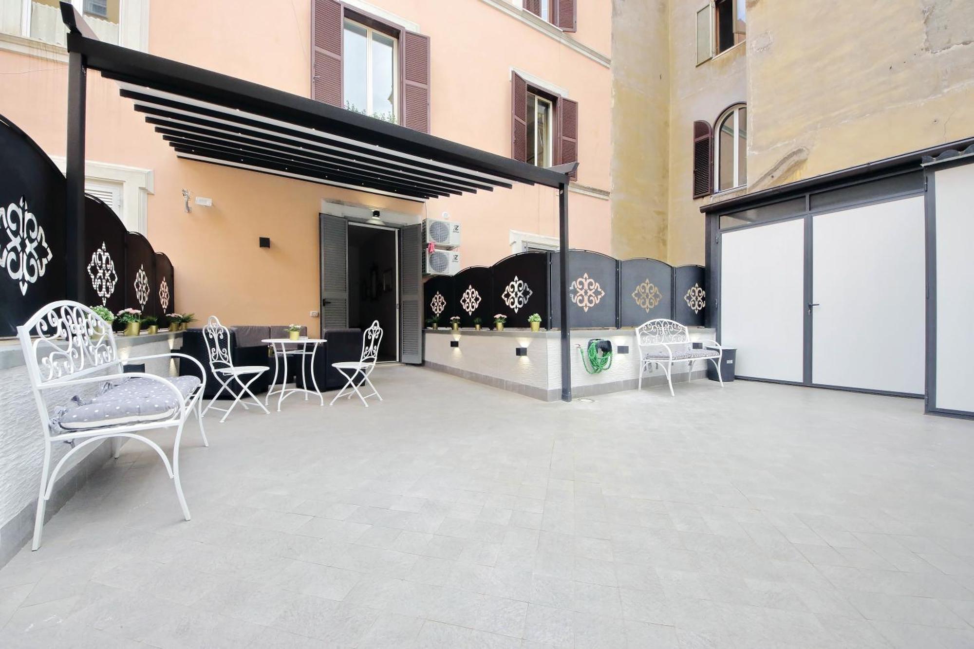 Casa de hóspedes Roman Holiday Suites